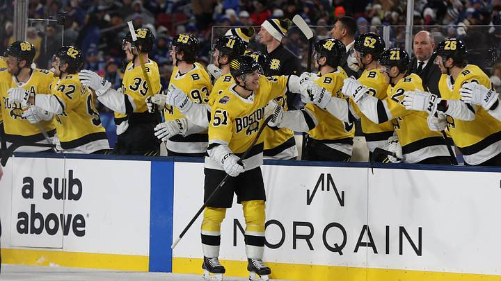 Feb 1, 2026; Tampa Bay, Florida, USA; Boston Bruins center Matthew Poitras (51) celebrates a goal against the Tampa Bay Lightning with the bench during the second period in the 2026 Stadium Series ice hockey game at Raymond James Stadium. Mandatory Credit: Kim Klement Neitzel-Imagn Images Feb 1, 2026; Tampa Bay, Florida, USA; Boston Bruins center Matthew Poitras (51) celebrates a goal against the Tampa Bay Lightning with the bench during the second period in the 2026 Stadium Series ice hockey game at Raymond James Stadium. Mandatory Credit: Kim Klement Neitzel-Imagn Images
