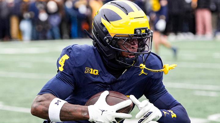 Michigan wide receiver Andrew Marsh (4) warms up at Michigan Stadium in Ann Arbor on Saturday, Nov. 29, 2025. Michigan wide receiver Andrew Marsh (4) warms up at Michigan Stadium in Ann Arbor on Saturday, Nov. 29, 2025.