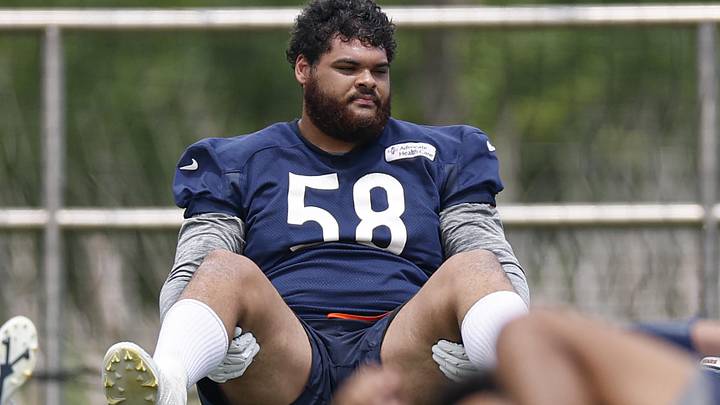 Jun 3, 2025; Lake Forest, IL, USA; Chicago Bears offensive tackle Darnell Wright (58) warms up during minicamp at Halas Hall. Mandatory Credit: Kamil Krzaczynski-Imagn Images