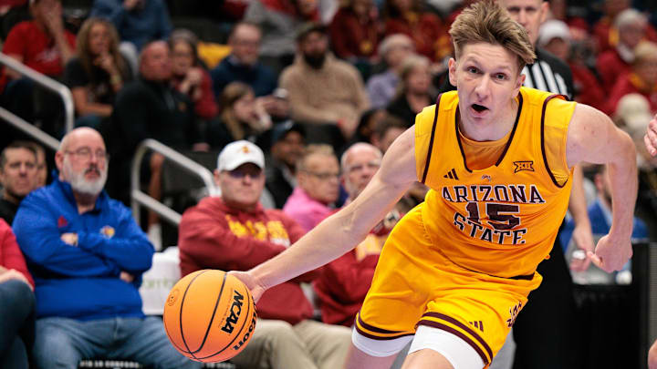 Mar 11, 2026; Kansas City, MO, USA; Arizona State Sun Devils guard Noah Meeusen (15) drives to the basket around Iowa State Cyclones forward Milan Momcilovic (22) during the second half at T-Mobile Center. Mandatory Credit: William Purnell-Imagn Images