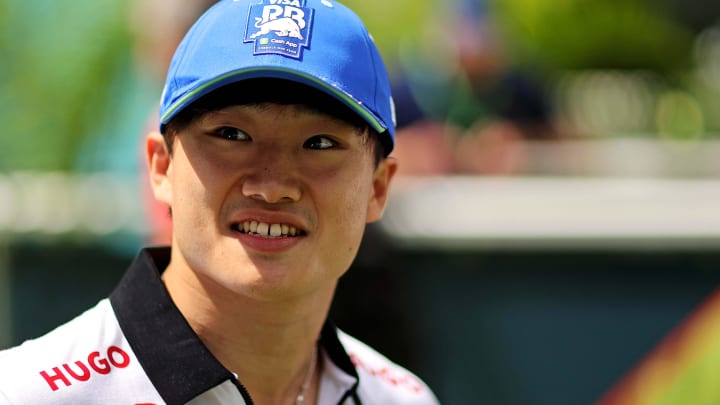 May 5, 2024; Miami Gardens, Florida, USA; RB racing driver Yuki Tsunoda (22) walks into the F1 Village before the F1 Miami Grand Prix at Miami International Autodrome. Mandatory Credit: Peter Casey-USA TODAY Sports