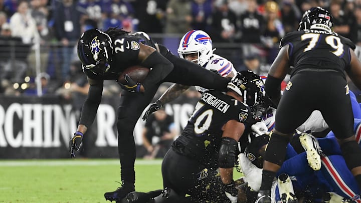 Sep 29, 2024; Baltimore, Maryland, USA;  Baltimore Ravens running back Derrick Henry (22) rushes over the pile during the first half against the Buffalo Bills at M&T Bank Stadium. Mandatory Credit: Tommy Gilligan-Imagn Images