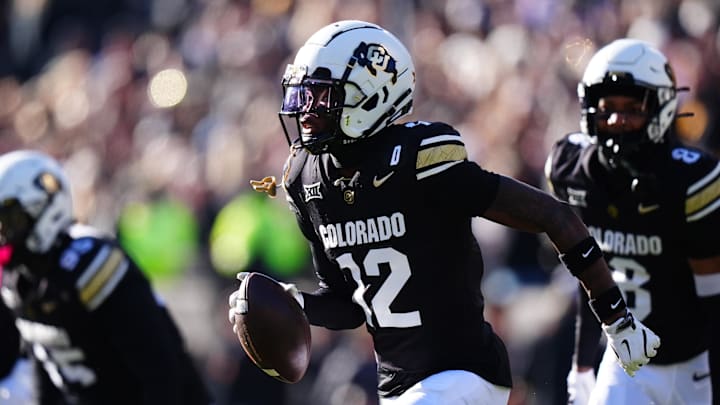 Nov 29, 2024; Boulder, Colorado, USA; Colorado Buffaloes cornerback Travis Hunter (12) following an interception in the first quarter against the Oklahoma State Cowboys at Folsom Field. Nov 29, 2024; Boulder, Colorado, USA; Colorado Buffaloes cornerback Travis Hunter (12) following an interception in the first quarter against the Oklahoma State Cowboys at Folsom Field.