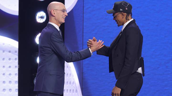 Jun 23, 2026; New York, NY, USA; NBA commissioner Adam Silver greets the twenty second pick in the 2026 NBA draft, Alabama guard Labaron Philon Jr. after he was selected by the Philadelphia 76ers at Barclays Center. Mandatory Credit: Brad Penner-Imagn Images