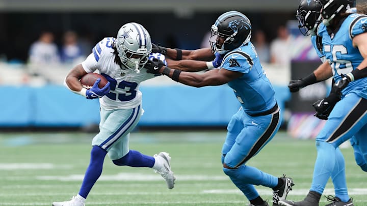 Oct 12, 2025; Charlotte, North Carolina, USA; Dallas Cowboys running back Jaydon Blue (23) runs with the ball during the second quarter against the Carolina Panthers at Bank of America Stadium. Mandatory Credit: Cory Knowlton-Imagn Images Oct 12, 2025; Charlotte, North Carolina, USA; Dallas Cowboys running back Jaydon Blue (23) runs with the ball during the second quarter against the Carolina Panthers at Bank of America Stadium. Mandatory Credit: Cory Knowlton-Imagn Images
