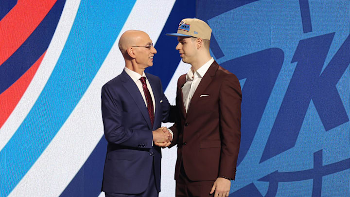 Jun 26, 2024; Brooklyn, NY, USA; Nikola Topic shakes hands with NBA commissioner Adam Silver after being selected in the first round by the Oklahoma City Thunder in the 2024 NBA Draft at Barclays Center. Mandatory Credit: Brad Penner-Imagn Images Jun 26, 2024; Brooklyn, NY, USA; Nikola Topic shakes hands with NBA commissioner Adam Silver after being selected in the first round by the Oklahoma City Thunder in the 2024 NBA Draft at Barclays Center. Mandatory Credit: Brad Penner-Imagn Images
