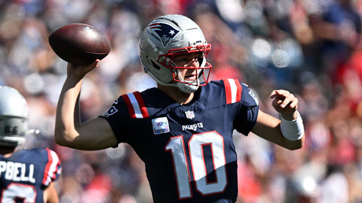 New England Patriots quarterback Drake Maye (10) looks to throw against the Carolina Panthers during the first half at Gillette Stadium. New England Patriots quarterback Drake Maye (10) looks to throw against the Carolina Panthers during the first half at Gillette Stadium.
