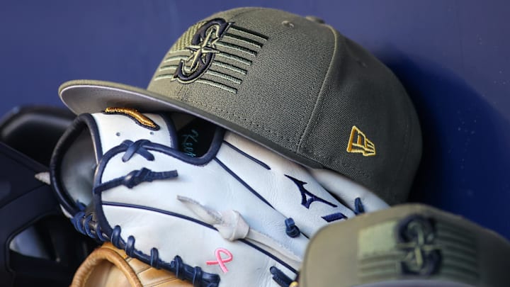 The Seattle Mariners Armed Forces Day hat is pictured in the dugout before a game against the Atlanta Braves on May 20, 2023, at Truist Park.