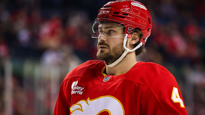 Dec 31, 2025; Calgary, Alberta, CAN; Calgary Flames defenseman Rasmus Andersson (4) against the Philadelphia Flyers during the first period at Scotiabank Saddledome. Mandatory Credit: Sergei Belski-Imagn Images