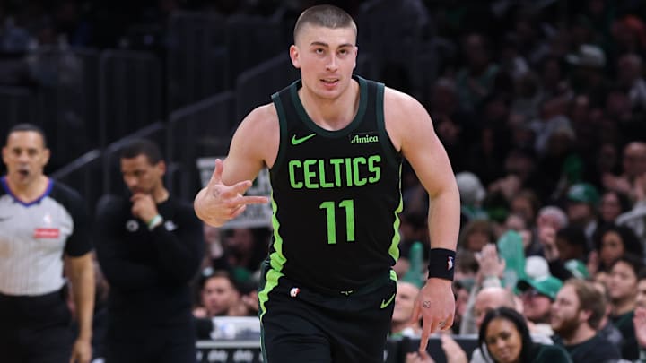 Apr 13, 2025; Boston, Massachusetts, USA; Boston Celtics guard Payton Pritchard (11) reacts after making a there pointer during the second half against the Charlotte Hornets at TD Garden. Mandatory Credit: Paul Rutherford-Imagn Images
