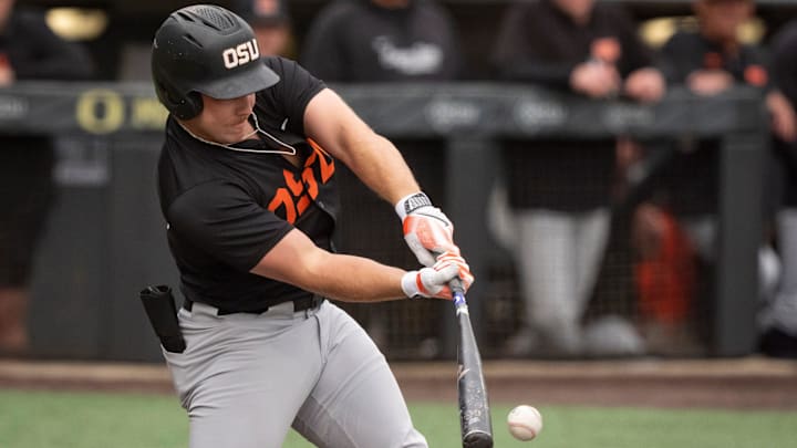 Oregon State catcher Wilson Weber hits a single as the Oregon Ducks host the Oregon State Beavers on April 25, 2025, at PK Park in Eugene.