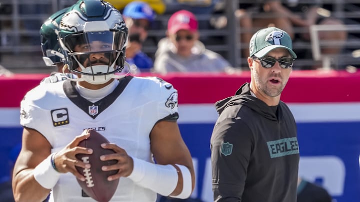 Philadelphia Eagles quarterback Jalen Hurts (1) and head coach Nick Sirianni pregame against the New York Giants at MetLife Stadium.