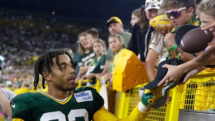 Green Bay Packers cornerback Jaire Alexander (23) signs autographs for fans during Family Night on Aug. 5, 2023, at Lambeau Field in Green Bay, Wis.