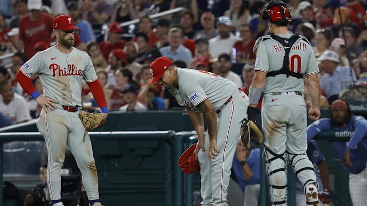 Aug 15, 2025; Washington, District of Columbia, USA; Philadelphia Phillies pitcher Jhoan Duran (59) reacts after being hit on the leg by a line drive by Washington Nationals third baseman Paul DeJong (not pictured) during the ninth inning at Nationals Park. Mandatory Credit: Geoff Burke-Imagn Images