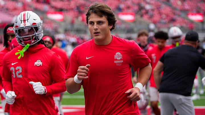 Ohio State Buckeyes quarterback Julian Sayin (10) runs off the field before the college football game against the Maryland Terrapins Ohio State Buckeyes quarterback Julian Sayin (10) runs off the field before the college football game against the Maryland Terrapins