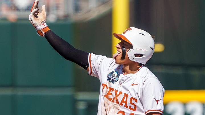 Adrian Rodriguez celebrates after driving in a run on a double against the Alabama Crimson Tide. 