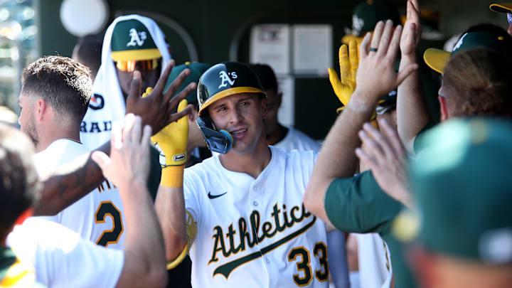 Aug 3, 2025; West Sacramento, California, USA; Athletics left fielder JJ Bleday (33) celebrates with teammates after hitting a solo home run against the Arizona Diamondbacks during the ninth inning at Sutter Health Park. Mandatory Credit: Dennis Lee-Imagn Images
