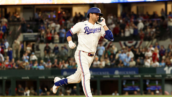 Apr 7, 2026; Arlington, Texas, USA; Texas Rangers catcher Kyle Higashioka (11) runs the bases after hitting a two-run home run during the fifth inning against the Seattle Mariners at Globe Life Field. Mandatory Credit: Kevin Jairaj-Imagn Images Apr 7, 2026; Arlington, Texas, USA; Texas Rangers catcher Kyle Higashioka (11) runs the bases after hitting a two-run home run during the fifth inning against the Seattle Mariners at Globe Life Field. Mandatory Credit: Kevin Jairaj-Imagn Images