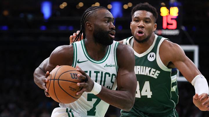 Oct 28, 2024; Boston, Massachusetts, USA; Boston Celtics forward Jaylen Brown (7) drives to the basket defended by Milwaukee Bucks forward Giannis Antetokounmpo (34) during the second half at TD Garden. Mandatory Credit: Paul Rutherford-Imagn Images
