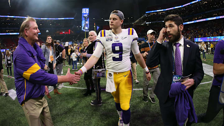 LSU Tigers quarterback Joe Burrow (9) leaves the field after defeating the Oklahoma Sooners in the 2019 Peach Bowl college football playoff semifinal game at Mercedes-Benz Stadium. 