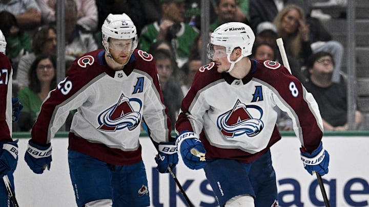 May 15, 2024; Dallas, Texas, USA; Colorado Avalanche center Nathan MacKinnon (29) and defenseman Cale Makar (8) skate off the ice after Makar scores a power play goal against the Dallas Stars during the second period in game five of the second round of the 2024 Stanley Cup Playoffs at American Airlines Center. Mandatory Credit: Jerome Miron-Imagn Images