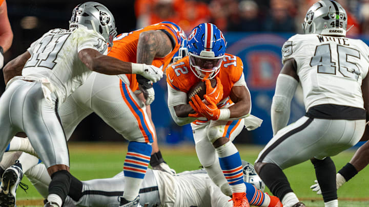 Las Vegas Raiders at Denver Broncos: Denver Broncos running back RJ Harvey (12) makes a rushing attempt during the NFL regular season game versus the Las Vegas Raiders at Empower Field at Mile High in Denver, Colorado on Nov 6, 2025. The Broncos defeated the Raiders 10-7. Las Vegas Raiders at Denver Broncos: Denver Broncos running back RJ Harvey (12) makes a rushing attempt during the NFL regular season game versus the Las Vegas Raiders at Empower Field at Mile High in Denver, Colorado on Nov 6, 2025. The Broncos defeated the Raiders 10-7.