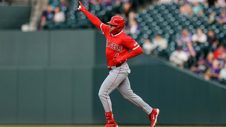 Sep 19, 2025; Denver, Colorado, USA; Los Angeles Angels second baseman Christian Moore (4) gestures on a two run home run in the second inning against the Colorado Rockies at Coors Field. Mandatory Credit: Isaiah J. Downing-Imagn Images