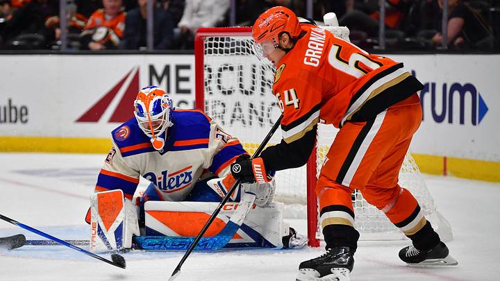 Oct 7, 2026; Anaheim, California, USA; Edmonton Oilers goalie Devon Levi (27) defends the goal against Anaheim Ducks center Mikael Granlund (64) during the third period at Honda Center. Mandatory Credit: Gary A. Vasquez-Imagn Images Oct 7, 2026; Anaheim, California, USA; Edmonton Oilers goalie Devon Levi (27) defends the goal against Anaheim Ducks center Mikael Granlund (64) during the third period at Honda Center. Mandatory Credit: Gary A. Vasquez-Imagn Images