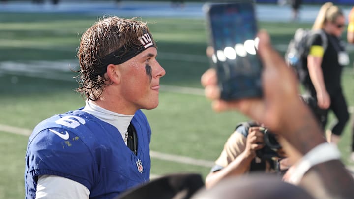 Sep 28, 2025; East Rutherford, New Jersey, USA; New York Giants quarterback Jaxson Dart (6) walks off the field after the game against the Los Angeles Chargers at MetLife Stadium. Mandatory Credit: Vincent Carchietta-Imagn Images
