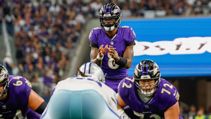Sep 22, 2024; Arlington, Texas, USA; Baltimore Ravens quarterback Lamar Jackson (8) looks over the line of scrimmage during the second quarter against the Dallas Cowboys at AT&T Stadium. Mandatory Credit: Andrew Dieb-Imagn Images Sep 22, 2024; Arlington, Texas, USA; Baltimore Ravens quarterback Lamar Jackson (8) looks over the line of scrimmage during the second quarter against the Dallas Cowboys at AT&T Stadium. Mandatory Credit: Andrew Dieb-Imagn Images