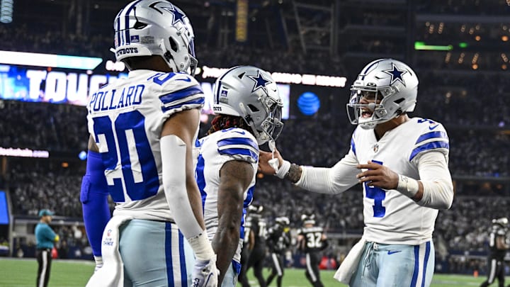 Dec 24, 2022; Arlington, Texas, USA; Dallas Cowboys wide receiver CeeDee Lamb (88) and running back