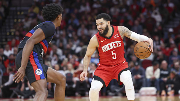 Jan 1, 2024; Houston, Texas, USA; Houston Rockets guard Fred VanVleet (5) dribbles the ball as Detroit Pistons forward Ausar Thompson (9) defends during the third quarter at Toyota Center. Mandatory Credit: Troy Taormina-Imagn Images