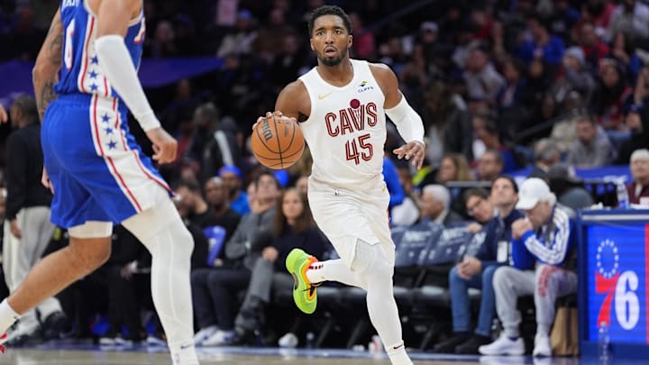 Nov 13, 2024; Philadelphia, Pennsylvania, USA; Cleveland Cavaliers guard Donovan Mitchell (45) controls the ball against the Philadelphia 76ers in the third quarter at Wells Fargo Center. Mandatory Credit: Kyle Ross-Imagn Images