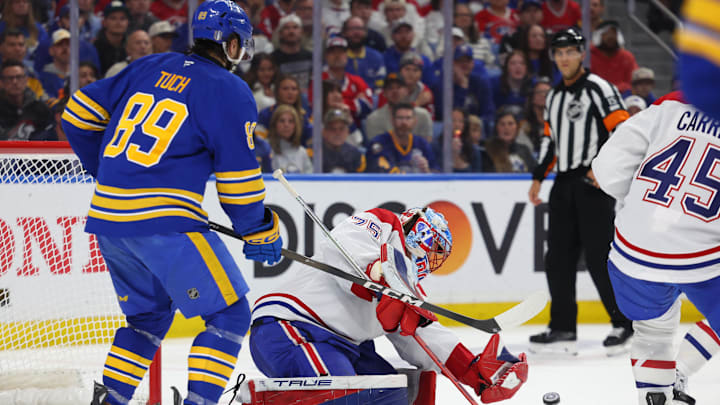 May 8, 2026; Buffalo, New York, USA; Buffalo Sabres right wing Alex Tuch (89) looks for a rebound as Montréal Canadiens goaltender Jakub Dobes (75) looks to make a save during the second period in game two of the second round of the 2026 Stanley Cup Playoffs at KeyBank Center. Mandatory Credit: Timothy T. Ludwig-Imagn Images