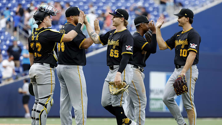 The Pittsburgh Pirates celebrate after defeating the Miami Marlins; with their victory on Sunday, they secured the series sweep