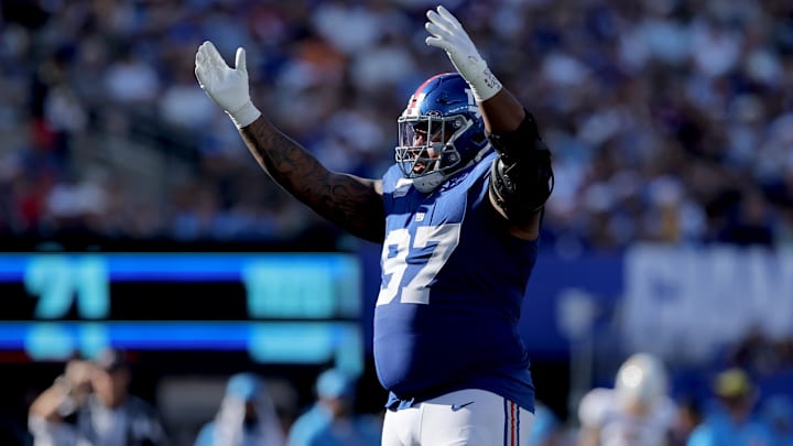 Sep 28, 2025; East Rutherford, New Jersey, USA; New York Giants defensive tackle Dexter Lawrence (97) reacts during the fourth quarter against the Los Angeles Chargers at MetLife Stadium. Mandatory Credit: Brad Penner-Imagn Images