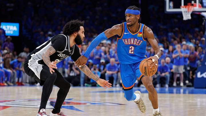 May 30, 2026; Oklahoma City, Oklahoma, USA; Oklahoma City Thunder guard Shai Gilgeous-Alexander (2) controls the ball against San Antonio Spurs forward Julian Champagnie (30) in the fourth quarter during game seven of the western conference finals for the 2026 NBA playoffs at Paycom Center. Mandatory Credit: Alonzo Adams-Imagn Images May 30, 2026; Oklahoma City, Oklahoma, USA; Oklahoma City Thunder guard Shai Gilgeous-Alexander (2) controls the ball against San Antonio Spurs forward Julian Champagnie (30) in the fourth quarter during game seven of the western conference finals for the 2026 NBA playoffs at Paycom Center. Mandatory Credit: Alonzo Adams-Imagn Images