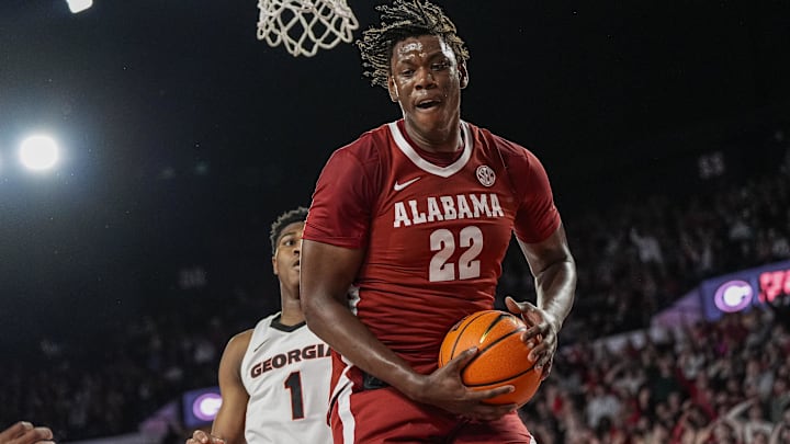 Mar 3, 2026; Athens, Georgia, USA; Alabama Crimson Tide forward Aiden Sherrell (22) grabs a rebound against the Georgia Bulldogs at Stegeman Coliseum. Mandatory Credit: Dale Zanine-Imagn Images