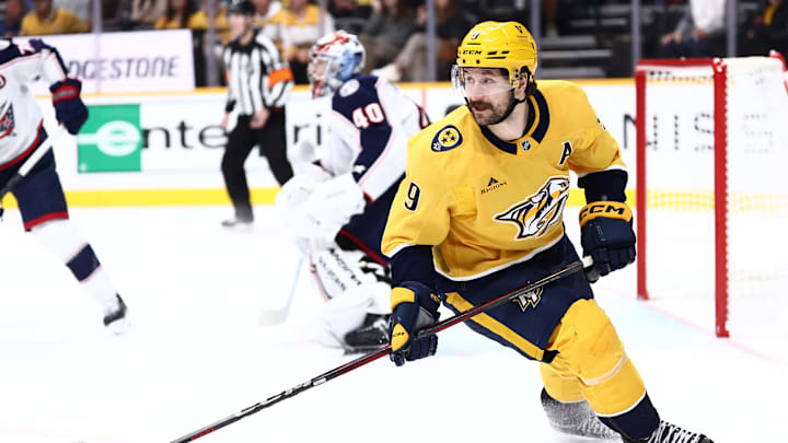 Oct 26, 2024; Nashville, Tennessee, USA; Nashville Predators left wing Filip Forsberg (9) skates away from the net after a shot on goal in the third period against the Columbus Blue Jackets at Bridgestone Arena. Mandatory Credit: Casey Gower-Imagn Images