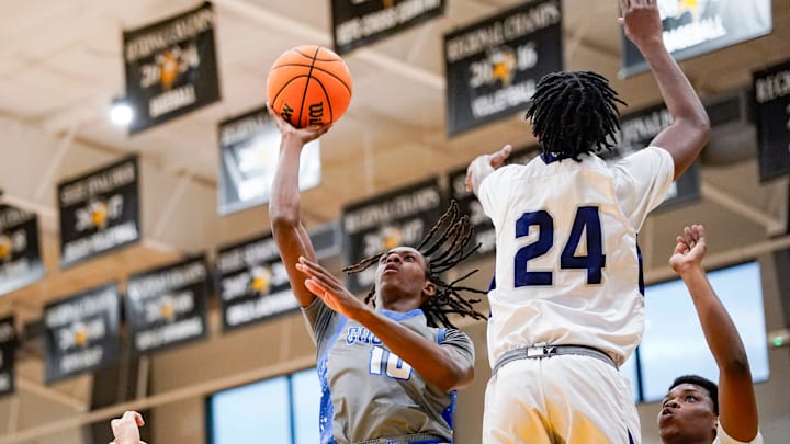 Barron Collier Cougars guard Myles Walker (10) shoots the ball during the first quarter of a Holiday Hoopfest game against the Taravella Trojans at Bishop Verot High School in Fort Myers, Fla., on Friday, Dec. 27, 2024.