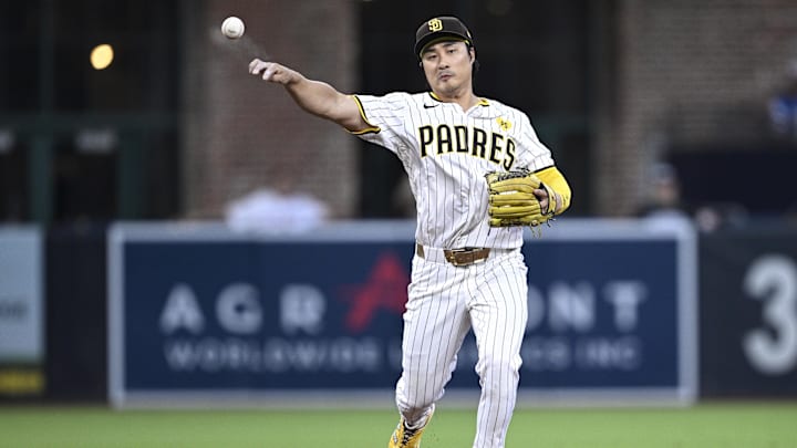 Aug 13, 2024; San Diego, California, USA; San Diego Padres shortstop Ha-Seong Kim (7) throws to first base against the Pittsburgh Pirates during the third inning at Petco Park. Mandatory Credit: Orlando Ramirez-Imagn Images