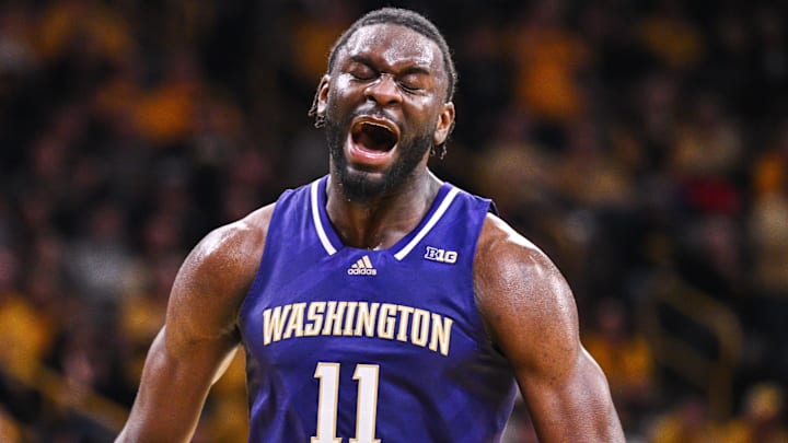 Feb 22, 2025; Iowa City, Iowa, USA; Washington Huskies center Franck Kepnang (11) reacts during the second half against the Iowa Hawkeyes at Carver-Hawkeye Arena. Mandatory Credit: Jeffrey Becker-Imagn Images