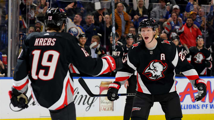 Jan 21, 2023; Buffalo, New York, USA;  Buffalo Sabres center Peyton Krebs (19) celebrates his goal with defenseman Rasmus Dahlin (26) during the second period against the Anaheim Ducks at KeyBank Center. Mandatory Credit: Timothy T. Ludwig-Imagn Images