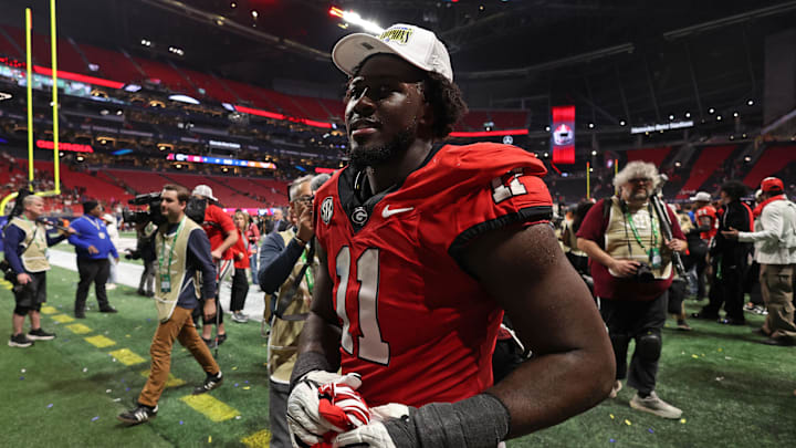 Dec 7, 2024; Atlanta, GA, USA; Georgia Bulldogs linebacker Jalon Walker (11) reacts after defeating the Texas Longhorns in overtime in the 2024 SEC Championship game at Mercedes-Benz Stadium. Mandatory Credit: Brett Davis-Imagn Images