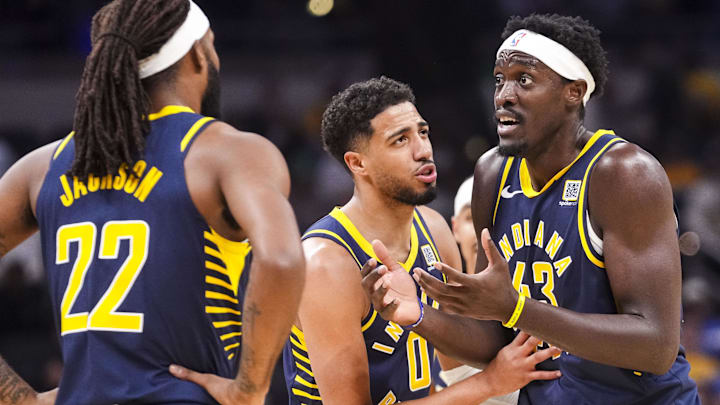 Oct 30, 2024; Indianapolis, Indiana, USA; Indiana Pacers guard Tyrese Haliburton (0) holds back forward Pascal Siakam (43) on during a game against the Boston Celtics  at Gainbridge Fieldhouse. Mandatory Credit: Grace Smith-Imagn Images