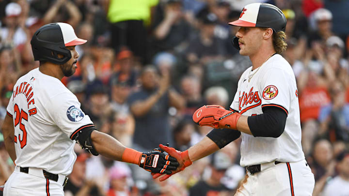 Jun 24, 2024; Baltimore, Maryland, USA; Baltimore Orioles shortstop Gunnar Henderson (2) celebrates with outfielder Anthony Santander (25) after scoring during the first inning against the Cleveland Guardians at Oriole Park at Camden Yards. Jun 24, 2024; Baltimore, Maryland, USA; Baltimore Orioles shortstop Gunnar Henderson (2) celebrates with outfielder Anthony Santander (25) after scoring during the first inning against the Cleveland Guardians at Oriole Park at Camden Yards.
