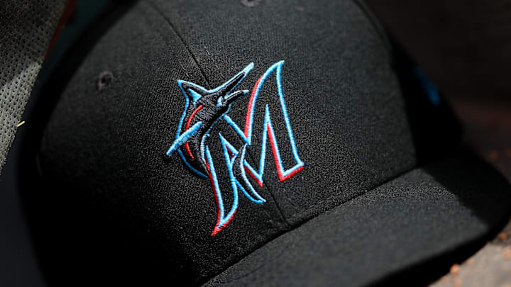 Apr 11, 2019; Cincinnati, OH, USA; A view of a New Era Miami Marlins hat in the dugout during the game against the Cincinnati Reds at Great American Ball Park. Mandatory Credit: Aaron Doster-Imagn Images