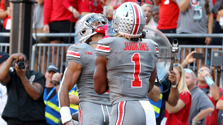 Oct 5, 2024; Columbus, Ohio, USA;  Ohio State Buckeyes wide receiver Emeka Egbuka (2) celebrates with running back Quinshon Judkins (1) after scoring a touchdown against the Iowa Hawkeyes during the third quarter at Ohio Stadium. Mandatory Credit: Joseph Maiorana-Imagn Images