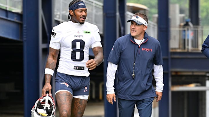 Jun 9, 2025; Foxborough, MA, USA; New England Patriots wide receiver Stefon Diggs (8) and offensive coordinator Josh McDaniels walk to the practice fields at Gillette Stadium. Mandatory Credit: Eric Canha-Imagn Images