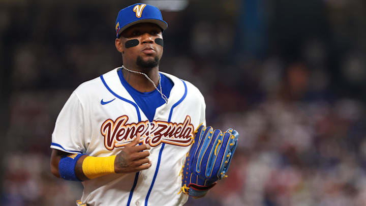 Mar 11, 2026; Miami, FL, United States; Venezuela outfielder Ronald Acuna Jr. (21) returns to the dugout against the Dominican Republic during the second inning at loanDepot Park. Mandatory Credit: Sam Navarro-Imagn Images